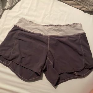 Lululemon speed ups, size 4, 4 inch in dark gray.